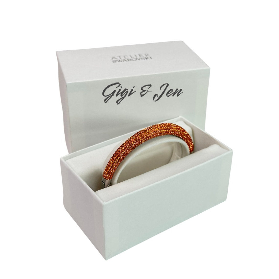 Swarovski atelier Tigris bangle Orange, Rhodium plated M Bracelet