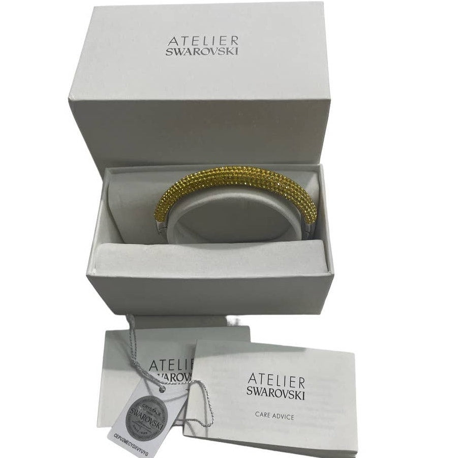 Swarovski Atelier Tigris bangle Yellow, Rhodium plated M Bracelet