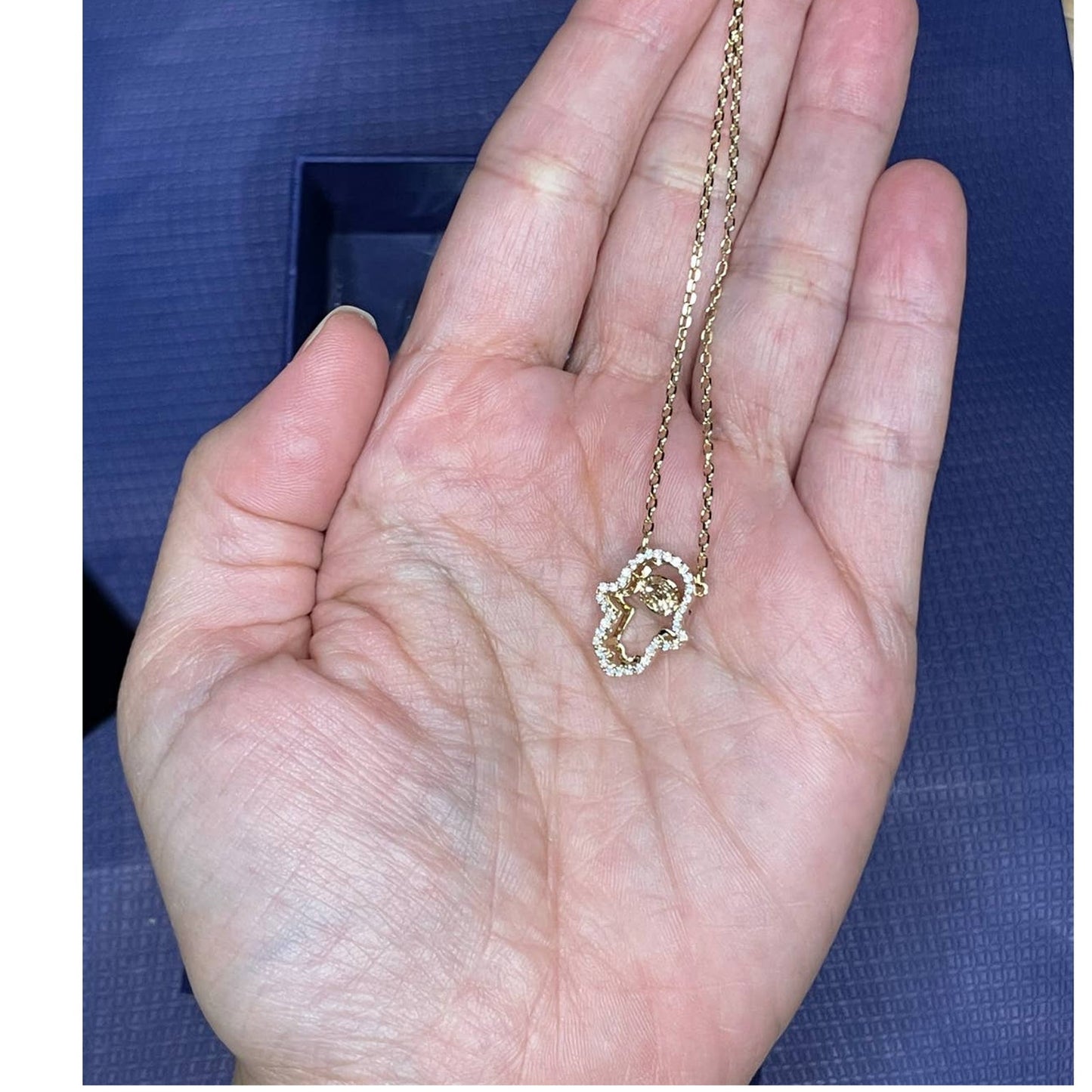 Swarovski Luckily Hamsa hand Pendant Necklace in Gold Tone Plated