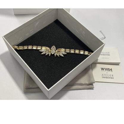Atelier Swarovski Wonder Woman bangle Gold tone, Gold-tone plated Bracelet