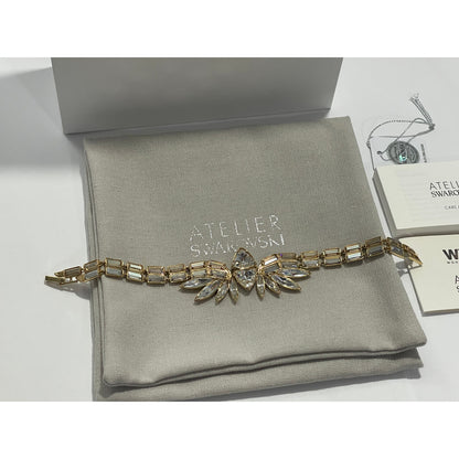 Atelier Swarovski Wonder Woman bangle Gold tone, Gold-tone plated Bracelet